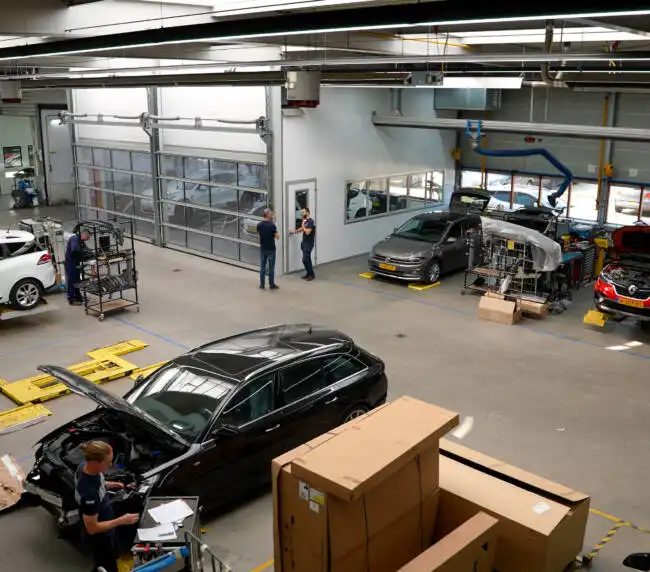 Car dealership with solar installation and EV charging